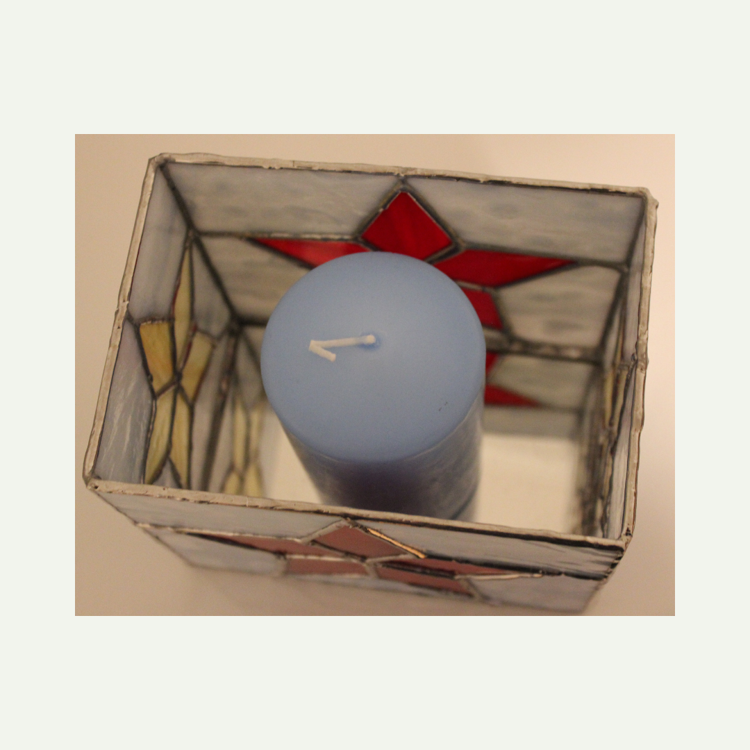 view inside of the lantern with a candle in it